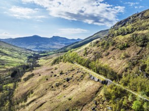 Mountains over Glen Ogle Viaduct from a drone, Road A85, Scotland, UK