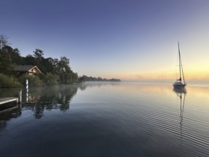 Evening atmosphere, sailing boat on Lake Starnberg, Bavaria, Germany