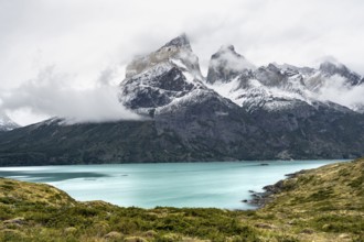 Blue lake Lago Nordenskjöld, Cuernos del Paine mountain range in autumn, Torres del Paine National