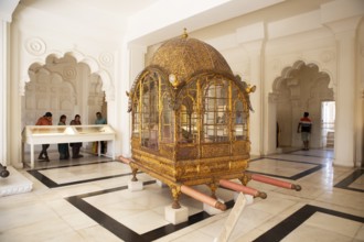 Golden palanquin in the Mehrangarh or Meherangarh fortress, Jodhpur, Rajasthan, India
