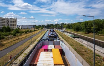 Barges in the Edersheim lock near Hattersheim, Hesse, Germany