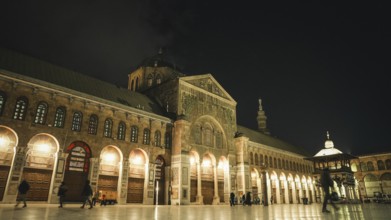 A night photo of the famous Umayyad Mosque in Damascus