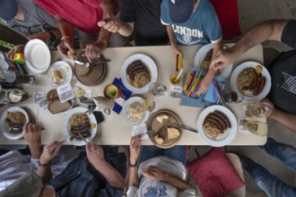 Food in a pub in Middle Franconia, Franconian Obazda, dressed cheese, sausages with sauerkraut and