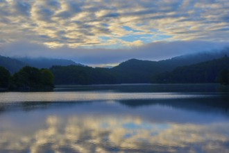 Morning sky with clouds reflected in calm lake, summer, Rursee, Obersee, Rurberg, Simmerath, Eifel