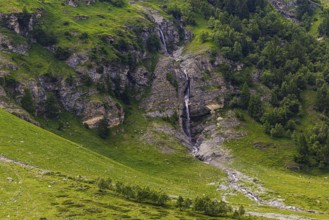 Waterfall cascading down a rock face, Zinal Valley, Val d'Anniviers, Valais Alps, Canton Valais,