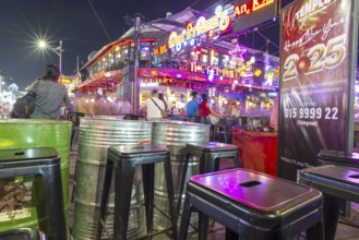 Neon lights, the legendary restaurant THE RED PIANO, Pub Street in the evening, entertainment