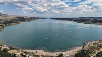 Aerial view of the Chronicle of Georgia with the Tbilisi Sea in the background