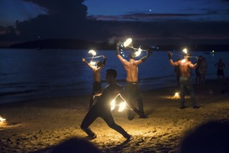 Fire show, jugglers with fire, Ao Nang Beach, sunset, Ao Nang, Krabi, Thailand