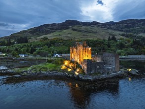 Night over Eilean Donan Castle and Loch Duich from a drone, Isle of Skye, Highlands, Scotland,