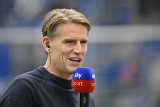 Sports Director Christoph Freund FC Bayern Munich FCB portrait in interview Microphone Micro Logo