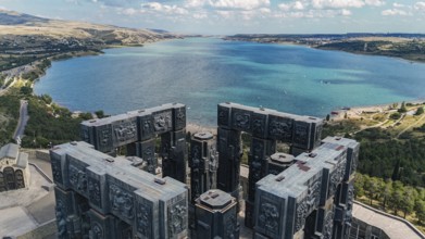 Aerial view of the Chronicle of Georgia with the Tbilisi Sea in the background