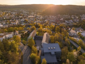 Panoramic view of the city at sunset with many trees and buildings, Nagold, Black Forest, Germany
