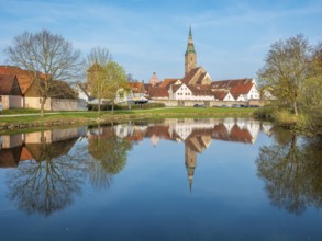 View of the old town, Liebfrauenmünster and town houses are reflected in the Schießweiher,
