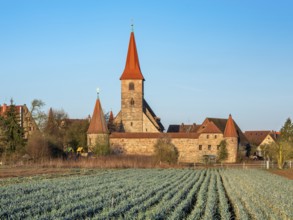 The medieval fortified church of St. George in the district of Kraftshof, Nuremberg, Middle