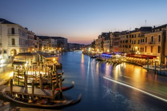 View of the Grand Canal at the blue hour, picturesque evening mood with illuminated palazzos on the