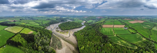 Panorama of Farms and fields over River Emme from a drone, Mothecombe, South Devon, England, United