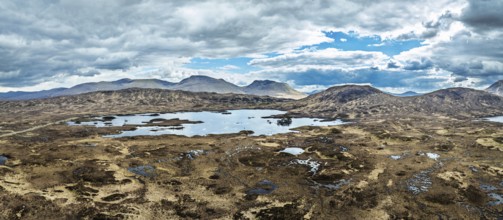 Panorama of Rannoch Moor from a drone over Loch Ba and Loch of the Armpit, A82 Highland Way, Argyll