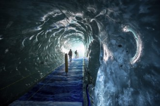 Artificial ice cave through the glacier ice, Mer de Glace, Montenvers, Chamonix, Haute-Savoie,