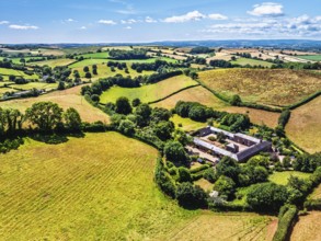 DefaultFarms and Fields over Torquay from a drone, Devon, England, United Kingdom
