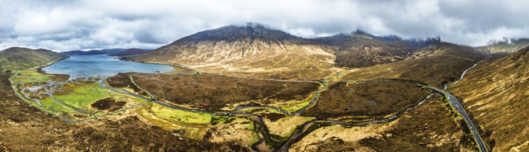 Panorama of Eas a' Bhradain Waterfall from drone, Red Cuillin mountains, Loch Ainort, Isle of Skye,