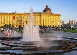 The Lustgarten with fountain and the Humboldt Forum, Berlin, Germany