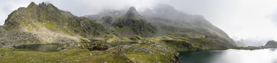 Mountain lakes Wangenitzsee and Kreuzsee, cloudy mountain peaks in the morning, Schober group, Hohe