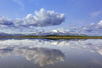Mountain peak Storsnasen in the Snasahögarna mountain range reflected in Lake Ånnsjön, Jämtland