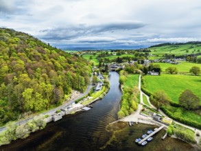 Farms and mountains over Ullswater Lake from drone, Pooley Bridge, Lake District National Park,