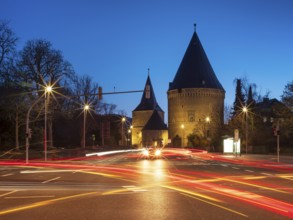 Wide Tor tor and Riesling tower at dusk with light traces of cars, part of the medieval town