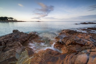 Rocky coast, sunrise, Plage de Palombaggia, Corsica, France