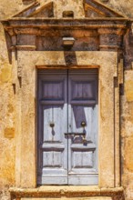 Entrance portal of the Madonna di Monserrato church, near Porto Azzurro, Elba Island, Tuscan
