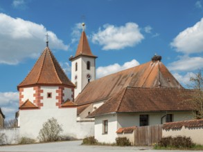 Church of the Visitation of the Virgin Mary in the village of Rauenzell in spring, storks and stork