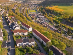 Bird's eye view of a residential area and adjoining fields in autumnal surroundings, Nagold, Calw