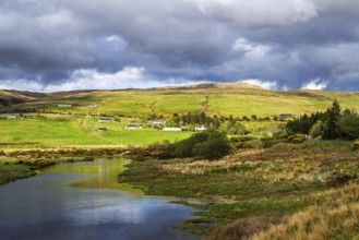 Farms over Loch Harport, Drynoch, Isle of Skye, Scotland, UK