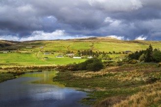 Farms over Loch Harport, Drynoch, Isle of Skye, Scotland, UK