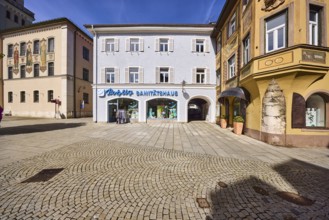 Sanitätshaus Hermann Pohlig, square, cobblestones, historic building, facade, windows, doors, blue