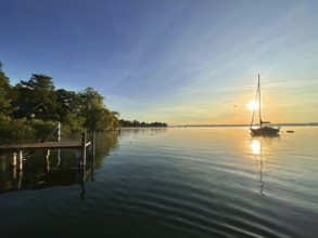 Evening atmosphere, sailing boat on Lake Starnberg, Bavaria, Germany