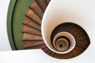 Spiral staircase with wooden steps, old staircase, Zurich, Switzerland