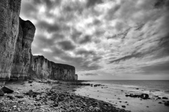 Cliff, cliffs, coastal landscape, rock formation, cloudy sky, sea, black and white, Yport, chalk
