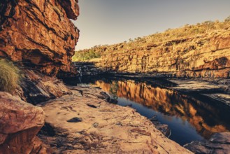 Bell Gorge waterfall, a body of water in north-west Australia in the Kimberley. Sunrise in the