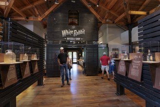 Visitors looking at display in the museum of the Jack Daniel Distillery in Lynchburg, Tennessee