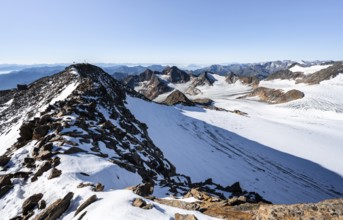 Snow on the Wilder Freiger mountain peak, picturesque high mountain landscape, view of
