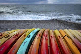 Kayaks, boats, colourful, lying on the beach, pebble beach, Étretat, sea, Normandy, Seine-Maritime,