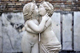 Statue of Love and Psyche, man and woman kissing, naked couple, stone carving in marble, excavation