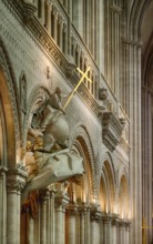 Interior view, angel on pulpit, holding a shining golden sword, Cathédrale Notre-Dame de Bayeux,