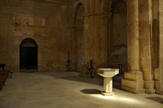 Baptismal font, remains of 14th century frescoes, side chapel, interior, Gothic basilica of the