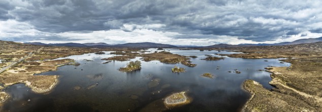 Panorama of Rannoch Moor from a drone over Loch Ba and Loch of the Armpit, A82 Highland Way, Argyll