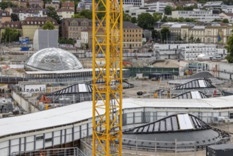 View of the roof of the future through station in Stuttgart. Light eyes provide the platforms of