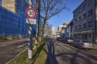 Tempo 30 sign, additional sign City, traffic sign, general development, trees, parking lane with