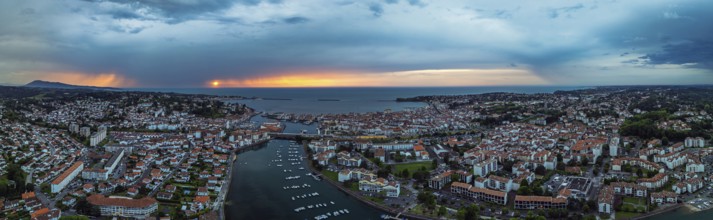 Panorama of Sunset over Saint-Jean-de-Luz from a drone, Nouvelle-Aquitaine, Pyrenees-Atlantiques,